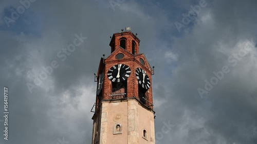 Clock on the tower. The big clock on the building shows the exact time.