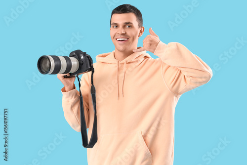 Male photographer with came...