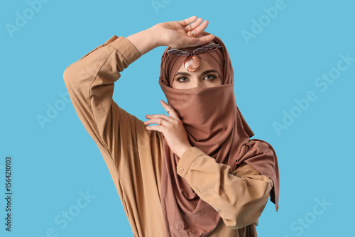 Beautiful Muslim woman in b...