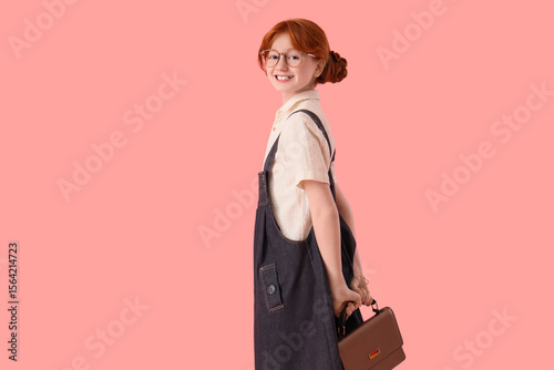 Cute ginger girl in stylish...