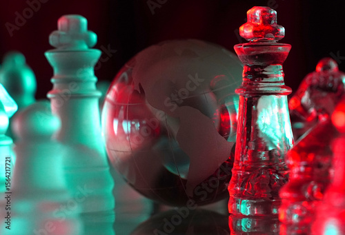Crystal planet Earth amidst chess pieces showing the American continent, representing concepts of geopolitics, global power, competition for control, international relations, world leaders, struggle f