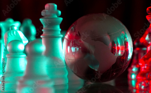 Crystal planet Earth amidst chess pieces showing the American continent, representing concepts of geopolitics, global power, competition for control, international relations, world leaders, struggle f