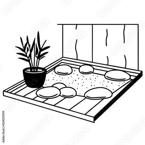 A miniature zen garden with sand, stones, and a plant isolated on white background