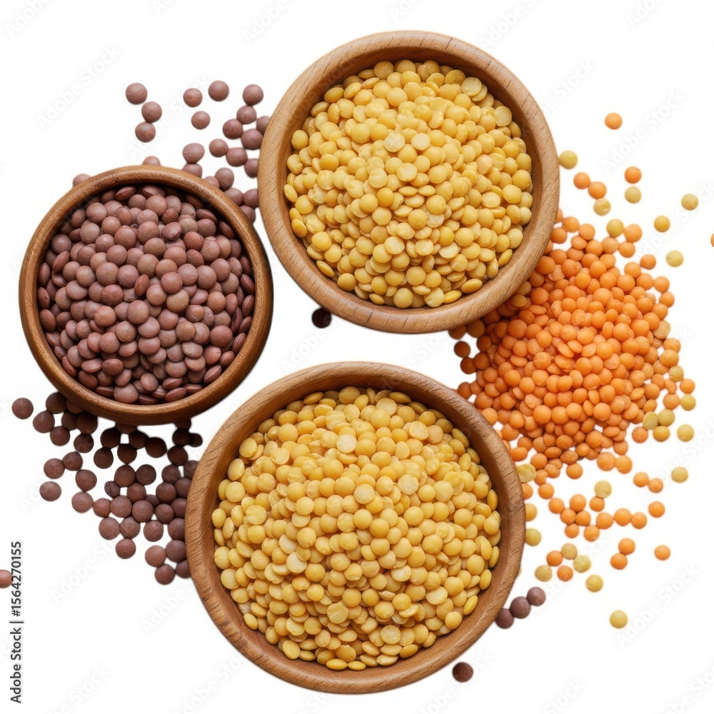 Obraz premium Various lentils types in wooden bowls on a white surface view top