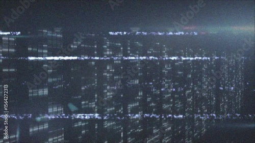 Initial glitch line snaking across data wall, pixel clusters flickering and visualizing corruption