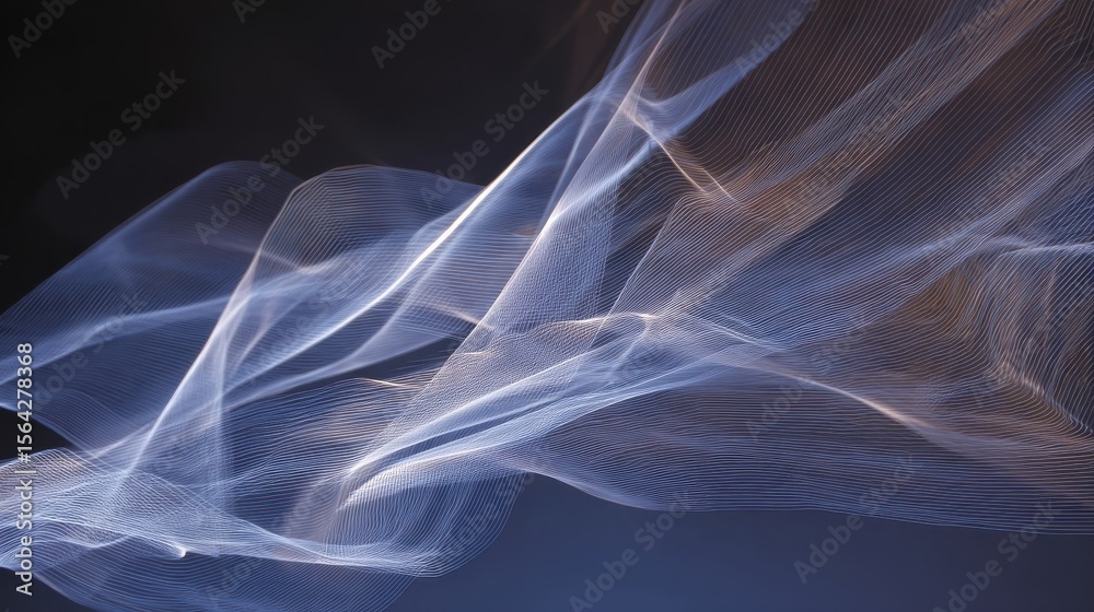 Fototapeta premium Flowing, translucent fabric against a dark background.