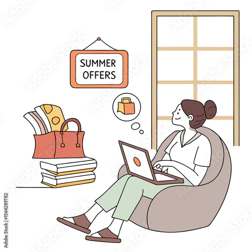 Young woman relaxing in a beanbag chair using her laptop to shop online during summer offers with a shopping bag and books nearby