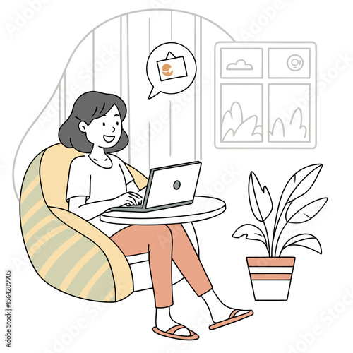 A happy woman is sitting comfortably in a beanbag chair using her laptop with a plant and window in the background