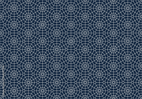 Seamless geometric pattern of interconnected hexagons with radial lines, creating intricate and modern design on a dark background.