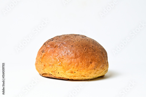 Side view of choco bun isolated on white background. clipping path, close up, baked, brown.