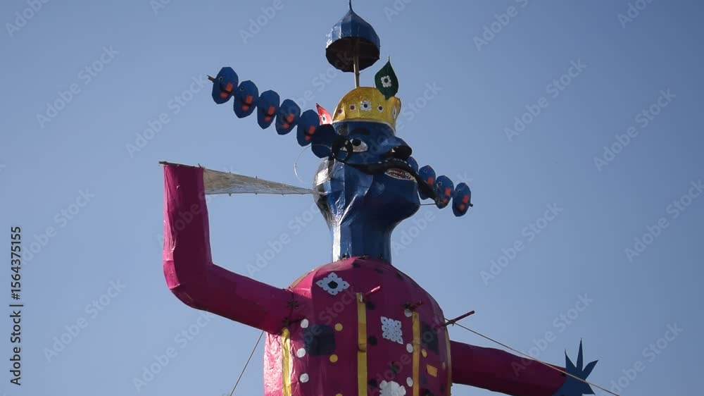 Ravnans being ignited during Dussehra festival at ramleela ground in Delhi, India, Big statue of Ravana to get fire during the Fair of Dussera to celebrate the victory of truth by Lord Rama