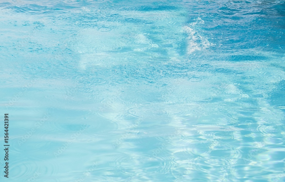 Flat design water surface is shimmering under bright sunlight with subtle ripples and reflections Flat design water surface is shimmering under bright sunlight with subtle ripples and reflections