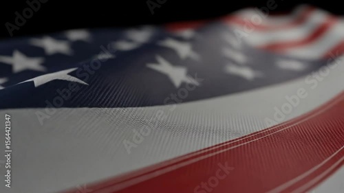 Extreme Close-Up Slow Motion of an American Flag's Fabric, a Detailed Macro View of the Stars and Stripes Rippling with Texture.