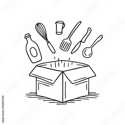An unpacked box with various kitchen tools lying around