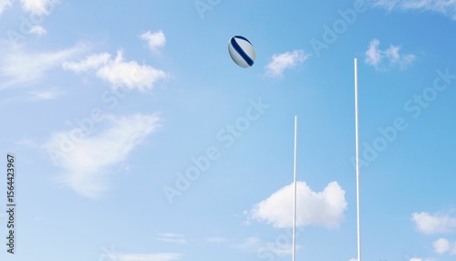 Rugby ball flying between posts