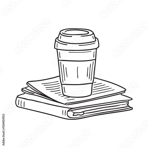 A coffee cup resting beside spread out notes on campus stairs