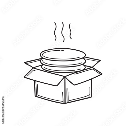 An unpacking box holding towels and plates