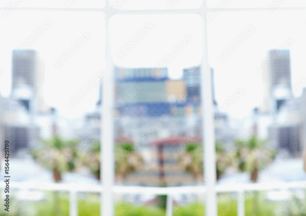 Fototapeta premium Flat design is showing bright overexposed urban skyline through white window frame with palm trees