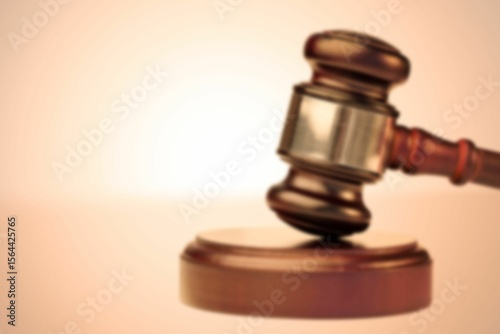 Close-up of gavel and wood
