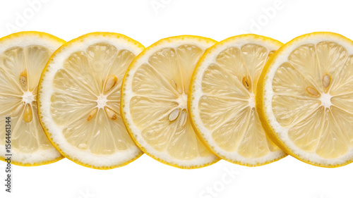 Foto Sliced lemons arranged in a row on black background