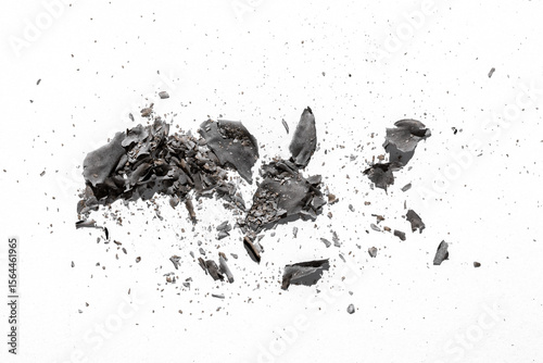 Obraz na plátne Ashes from the burning,grunge paper ash scattered isolated on white background,g