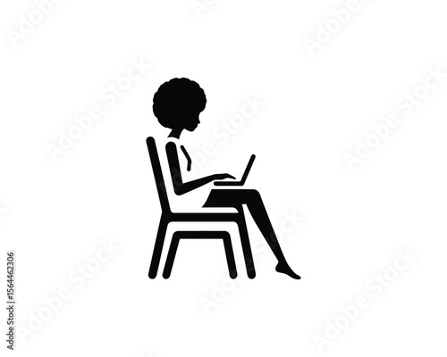 Black woman working on laptop  sitting chair