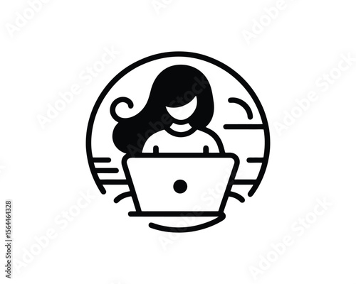 Woman working on laptop by the sea