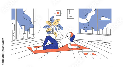 Young woman doing yoga exercises on a mat indoors with headphones on enjoying her workout routine