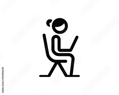 Woman working on laptop  sitting in chair