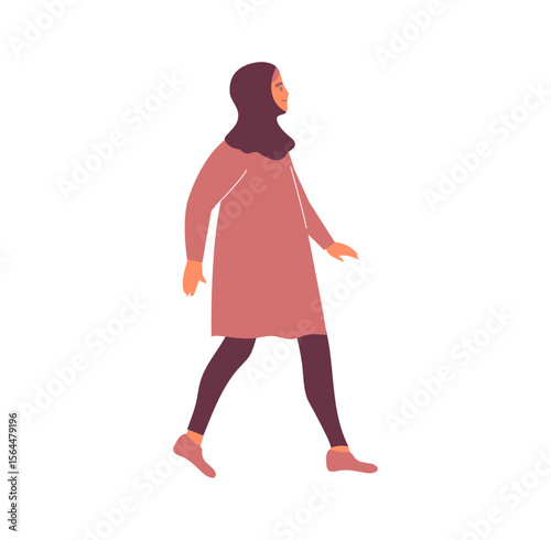 Elegant Promenade: A woman adorned in a hijab and modest attire, takes a dignified stroll. The scene encapsulates grace, and cultural identity. 
