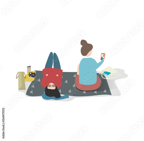 Leisure Time Friends Relaxing: Two friends enjoy their quality time together, one capturing a selfie moment while the other showcases an inverted pose.