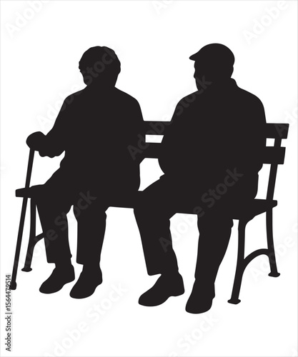 Silhouettes of senior citizens sitting on a park bench