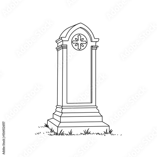 Gravestone monument with intricate design resting on grass  