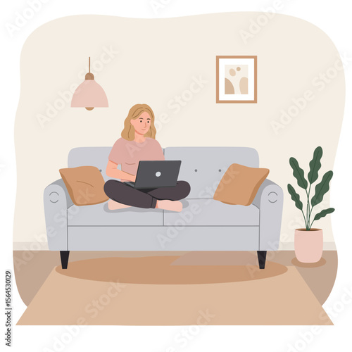 A young woman comfortably works from home on her laptop, participating in a virtual video conference from her cozy living room couch.