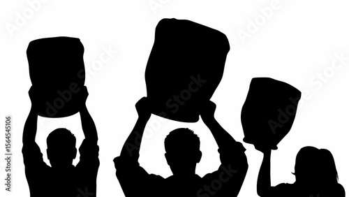 Silhouette of three people holding rectangular objects above their heads against a white background outdoors