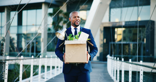 Fotografie Black man, leaving and business with box for new career, job opportunity or migration in city