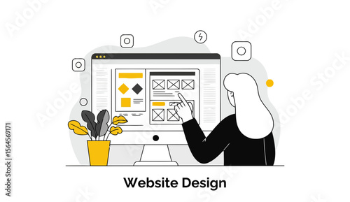 Female web designer reviewing website mockups at a home office. A woman with long hair, wearing a black jacket, is interacting with website layout designs on a computer monitor in a home workspace.