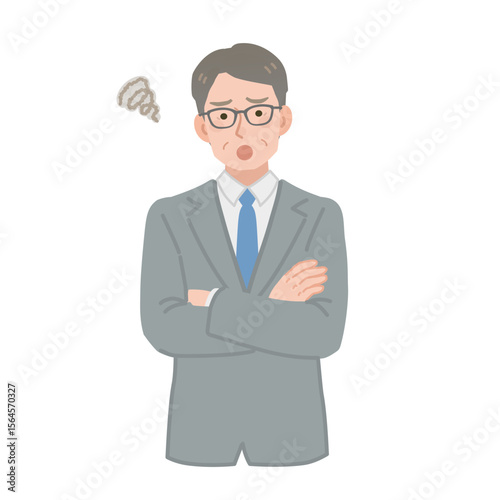 腕を組んで困っている中年サラリーマン