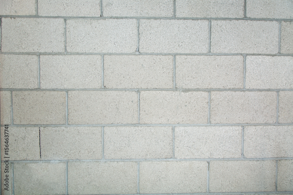 Naklejka premium A view of a cinder block wall, as a background.