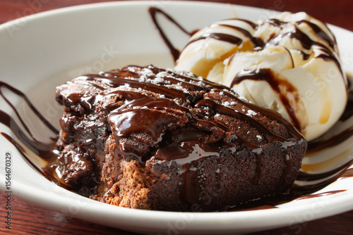 A closeup view of a brownie a la mode.