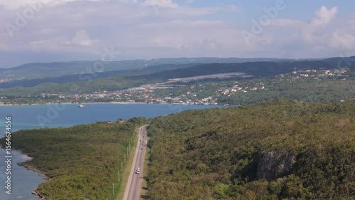 Wallpaper Mural Scenic drone view of Discovery Bay, Jamaica, highlighting its calm turquoise waters, lush coastal landscape, and serene residential areas Torontodigital.ca