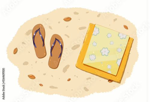 Summer flip-flops and beach towel on sandy background  