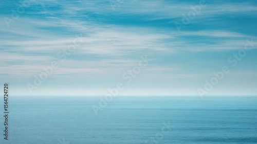 Wallpaper Mural Gentle waves meet soft blue sky creating a serene ocean seascape. Torontodigital.ca