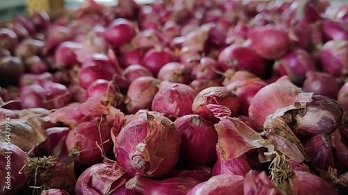 Footage of Fresh Red Onions displayed in a traditional market, a concept of healthy trade and food