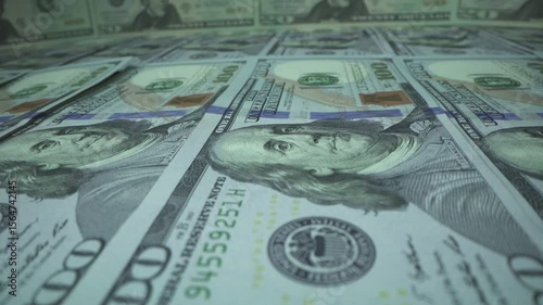Cash money banknotes. Macro 100 american dollar bills counting. Franklin's face texture. Finance, investment concept. Close-up shot. Currency exchange of one hundred USD. Rich business economy of USA