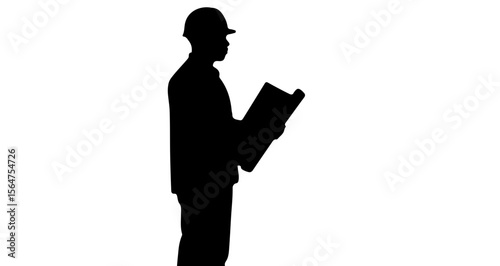 Silhouette of a construction worker wearing a hard hat and holding a blueprint in his hands standing up