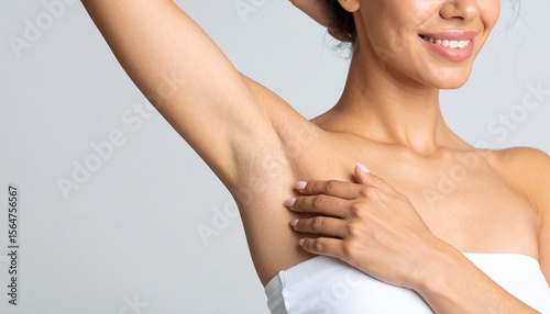 Woman Showing Smooth Underarm Skin Perfect for Beauty Product Advertisement.