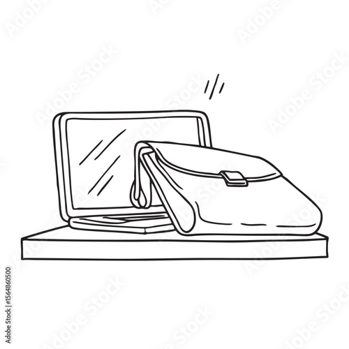 A laptop case overturned beneath a working desk