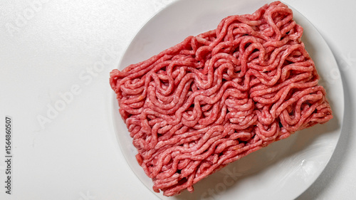 Valokuva Entwined tendrils of minced beef evoke culinary creativity, ideal for Meaty Mond