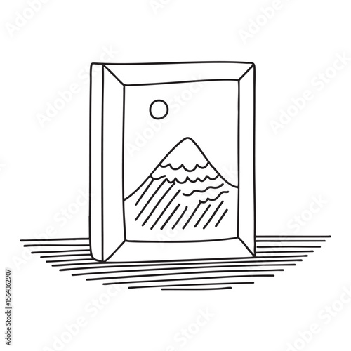 A crooked painting frame leaning on the wall surface